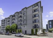 Thumbnail 10 of 20 - a picture of building exterior with cars parked in front of it at King Arthurs Court, Washington