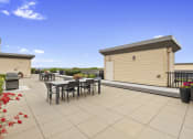 Thumbnail 14 of 22 - the roof terrace with resident seating areas to enjoy views at Villaggio Apartment Homes, Washington