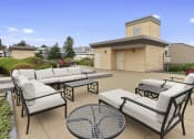 Thumbnail 15 of 22 - Rooftop Resident Lounge with cozy seating at Villaggio Apartment Homes, Washington