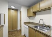 Thumbnail 4 of 19 - a kitchen with a sink and a dishwasher at Willows Court Apartment Homes, Seattle, Washington 98125