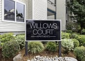Thumbnail 2 of 19 - Welcome sign at Property Building at Willows Court Apartment Homes, Seattle, WA
