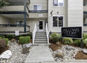 Thumbnail 5 of 19 - Front View of Property with Sign for Willows Court Apartment Homes, Seattle