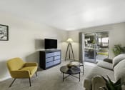 Thumbnail 16 of 25 - a living room filled with furniture and a flat screen tv