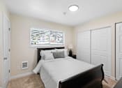 Thumbnail 22 of 23 - Spacious Bedroom with Large Closet, Plush Carpeting, and Overhead Lighting at Pinewood Square Apartment Homes, Washington