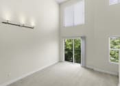 Thumbnail 17 of 27 - Loft Style Apartment with Massive Open Living Room Space, Wide Oversized Windows with Views of Greenery, Sliding Glass Door, and Lofty Ceilings at Sir Gallahad Apartment Homes, Bellevue