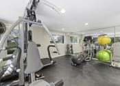 Thumbnail 8 of 27 - State-of-the-Art Fitness Center with a Variety of Exercise Equipment at Sir Gallahad Apartment Homes, Washington, 98004