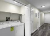 Thumbnail 25 of 30 - In unit laundry room with a washer and dryer at Swiss Gables Apartment Homes, Kent
