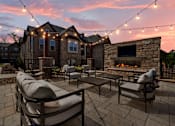 Thumbnail 45 of 75 - patio with fireplace and seating area at Griffin Weston, North Carolina, 27513