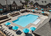 Thumbnail 40 of 75 - an aerial view of the resort style pool with lounge chairs and umbrellas at Griffin Weston, North Carolina