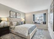 Thumbnail 9 of 31 - a bedroom with a large bed and a window  at Northridge, Rochester Hills, 48307