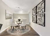 Thumbnail 4 of 31 - a dining room with a table and chairs  at Northridge, Rochester Hills, MI