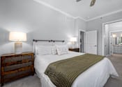 Thumbnail 62 of 75 - a bedroom with a bed and a dresser  at Griffin Weston, North Carolina, 27513