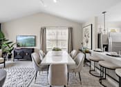 Thumbnail 7 of 24 - A modern dining room with a large table and chairs at Briarcliff Village, Michigan, 48390