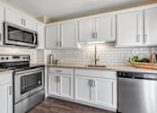 Thumbnail 13 of 36 - Fully Equipped Kitchen at Mainstreet Village, Novi, 48375
