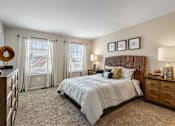 Thumbnail 16 of 36 - Comfortable Bedroom at Mainstreet Village, Novi, MI