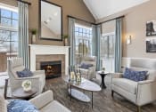 Thumbnail 10 of 15 - Clubroom With Fireplace at Brownstones, Novi, MI