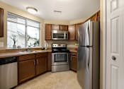 Thumbnail 4 of 22 - Fully Equipped Kitchen at Amberly Apartments, Michigan
