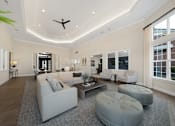 Thumbnail 25 of 34 - A spacious living room with a white sofa set and a grey ottoman at Cidermill Village Apartments in Rochester Hills, MI 