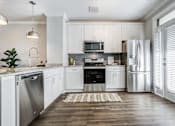 Thumbnail 48 of 75 - 2 Bedroom Townhome Kitchen at Griffin Weston, Cary, North Carolina