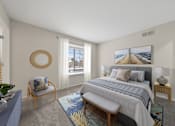 Thumbnail 3 of 17 - A bedroom with a large bed and a view of the beach.