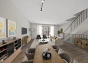Thumbnail 1 of 17 - A modern living room with a staircase on the right side.