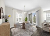 Thumbnail 12 of 22 - A modern dining room with a round table and chairs at Amberly Apartments, West Bloomfield, 48322