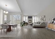 Thumbnail 6 of 22 - A modern living room with a fireplace and a dining table at Amberly Apartments, West Bloomfield, 48322