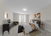 Thumbnail 8 of 22 - A bedroom with a large bed and a dresser at Amberly Apartments, West Bloomfield, 48322
