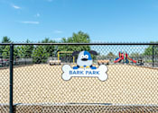 Thumbnail 27 of 62 - A sign that says Bark Park is on a fence.
