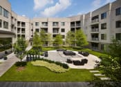 Thumbnail 8 of 18 - Courtyard Patio With Ample Sitting  at AVE Clifton, New Jersey