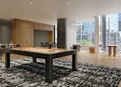 Thumbnail 14 of 14 - A shiny wooden pool table in a room with a black and white rug.
