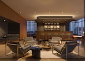 Thumbnail 5 of 14 - A modern living room with a large window and a view of the city.
