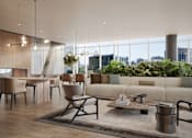 Thumbnail 6 of 14 - A modern living room with a large window overlooking the city.