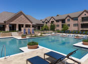 Thumbnail 6 of 13 - take a dip in the resort style pool at villas at houston levee west apartments at AVE Las Colinas, Texas