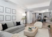Thumbnail 9 of 19 - A modern living room with a grey sofa and a coffee table at AVE Paradise Valley, Phoenix, 85032