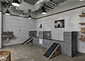 Thumbnail 28 of 30 - A room with a grey floor and white tiled walls.