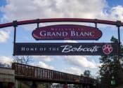 Thumbnail 39 of 39 - a sign for the grand blanc home