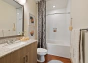 Thumbnail 24 of 39 - Bathroom with custom framed mirror