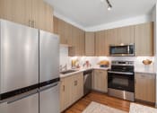 Thumbnail 23 of 39 - Gourmet chef kitchen with stainless steel appliances