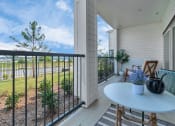 Thumbnail 22 of 37 - Apartment's private patio with fenced yard