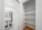 Thumbnail 19 of 27 - Clarendon Shores Closet Bathroom