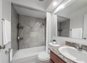 Thumbnail 8 of 28 - a bathroom with a toilet sink and bathtub