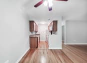 Thumbnail 17 of 28 - a kitchen and dining area in a 555 waverly unit