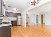 Thumbnail 15 of 28 - a kitchen and living room in a 555 waverly unit