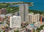 Thumbnail 27 of 28 - a cityscape with tall buildings and a body of water in the background