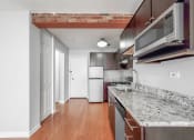Thumbnail 35 of 37 - Grace Shores Studio Kitchen
