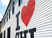 Thumbnail 29 of 29 - a white building with a red heart and the words i love chi