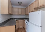 Thumbnail 10 of 13 - Winthrop Place  - Kitchen Photo