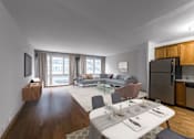 Thumbnail 16 of 45 - The Van der Rohe Living Room and Kitchen