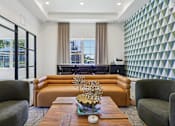 Thumbnail 42 of 53 - living room with a brown sofa at Vine + Vail Townhomes and Apartments, Texas